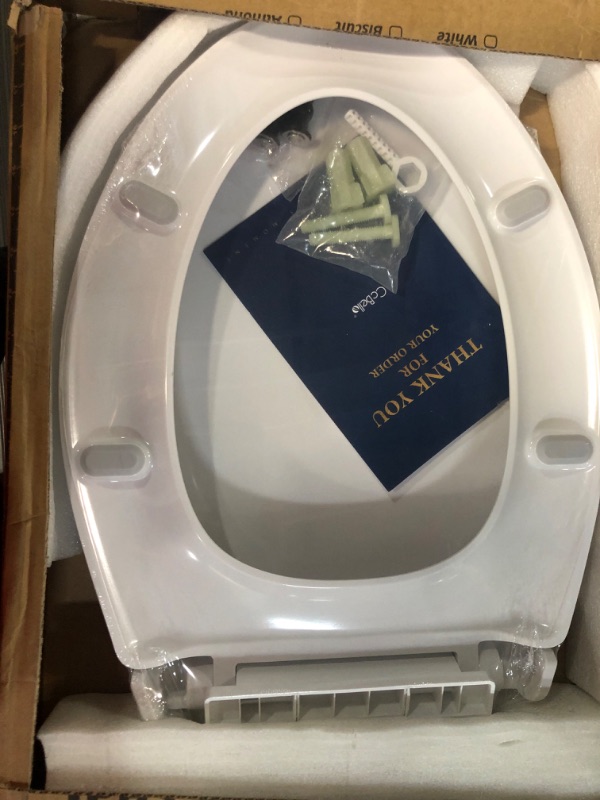 Photo 3 of **SMALL CRACK ON BACK CORNER** Elongated Toilet Seat , Quick-Release Hinges, Slow Close, Heavy Duty, Never Loosen, Aviation Material, White(18.5”) White Elongated