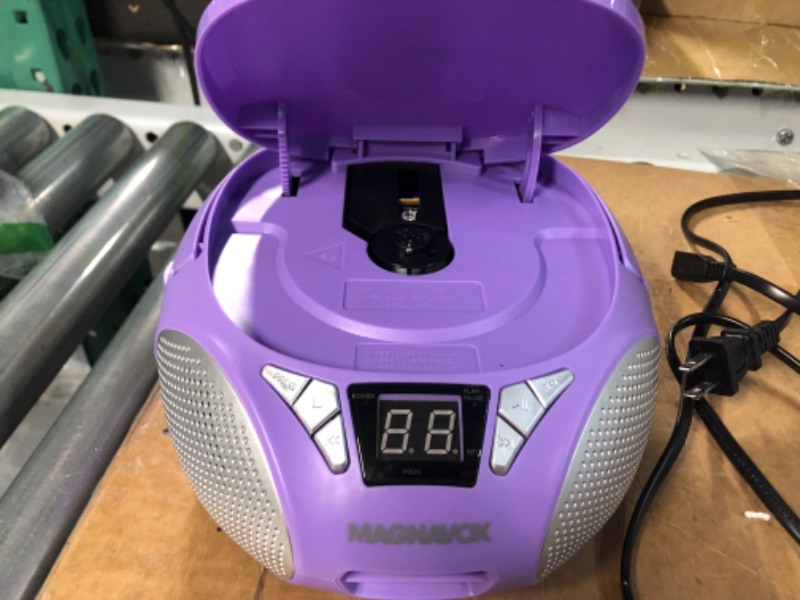 Photo 2 of Magnavox MD6924-PL Portable Top Loading CD Boombox with AM/FM Stereo Radio in Purple