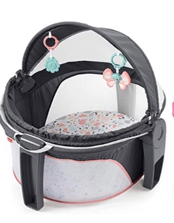 Photo 1 of Fisher-Price Portable Bassinet and Play Space On-The-Go Baby Dome with Developmental Toys and Canopy, Pink Pacific Pebble