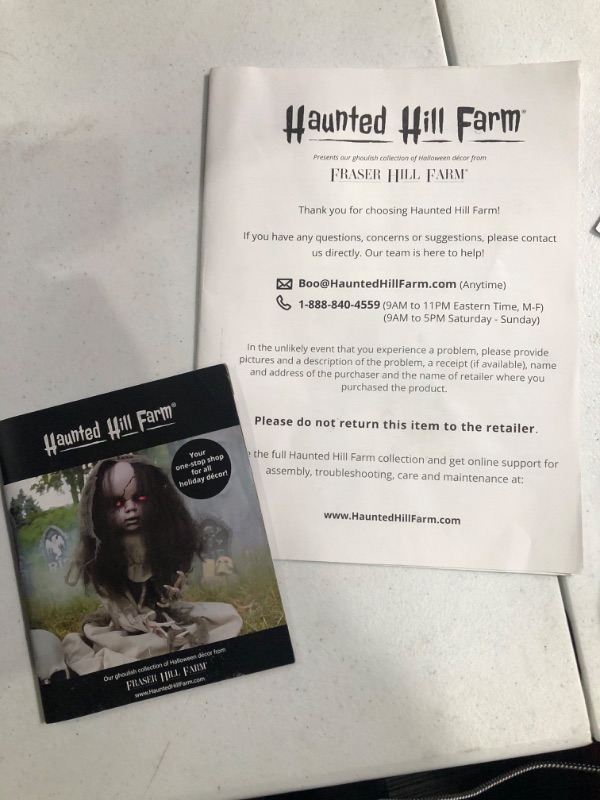 Photo 1 of NEW PRIOR  Haunted Hill Farm 22 in. Pop-Up Animatronic Ghoul, Indoor/Outdoor, Flashing Red Eyes, Battery-Operated, HHFJZOMB-1LSA Halloween Decoration, Color 6 22" Animated Jumping Zombie