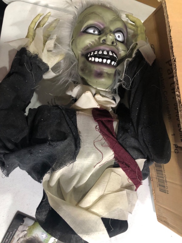 Photo 1 of NEW PRIOR  Haunted Hill Farm 22 in. Pop-Up Animatronic Ghoul, Indoor/Outdoor, Flashing Red Eyes, Battery-Operated, HHFJZOMB-1LSA Halloween Decoration, Color 6 22" Animated Jumping Zombie