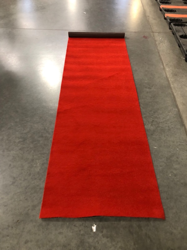 Photo 4 of ***USED - DIRTY - NO PACKAGING***
BannerBuzz Red Carpet, 1500 GSM Tufted Loop Pile of Polypropylene Yarn, Ideal for Indoor/Outdoor Events (3' W X 10' H, Red)