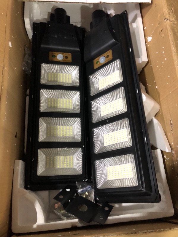 Photo 2 of **PARTS** LEDARUI 300W Solar Street Lights Outdoor, Dusk to Dawn LED Solar Street Lamps