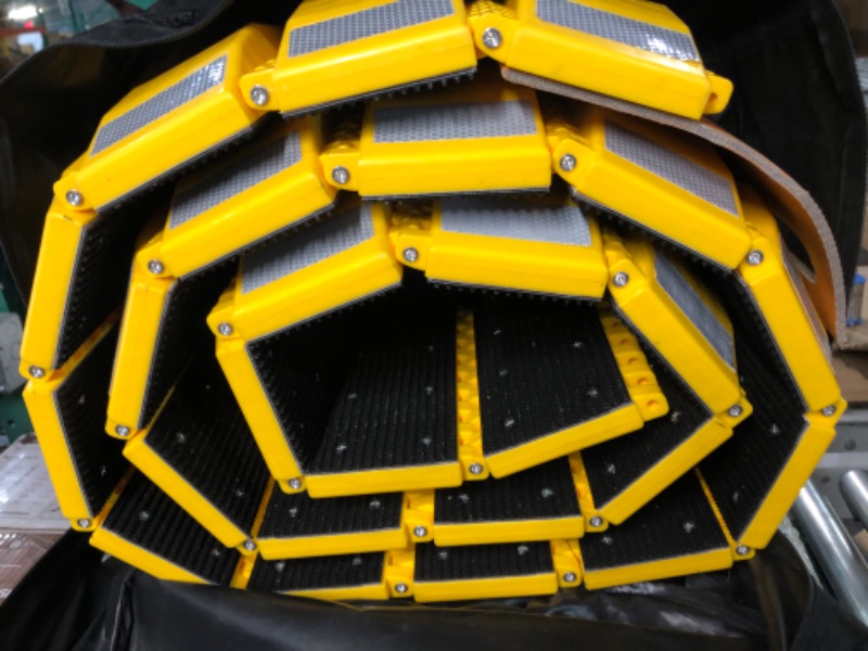 Photo 1 of Pyle Portable Vehicle Traffic Speed Bump - 9.8' ft Heavy Duty Reflective Plastic Humps, Car Truck Automotive Vehicles Speed Bumps for Asphalt Concrete Gravel Garage Driveway Roads Parking Lot - PSPD16