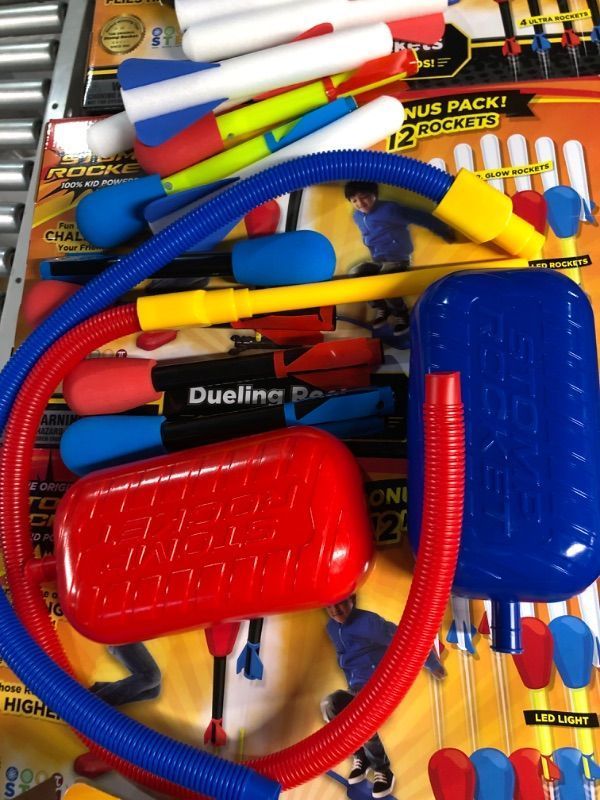 Photo 4 of Stomp Rocket Original Dueling Rocket Launcher for Kids - Soars 200 Feet - 8 Rockets and Multi-
