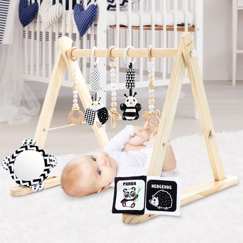 Photo 1 of BABY K Wooden Baby Play Gym (with 7 Toys) - Foldable Wooden Play Gym with Wooden and Monochrome Hanging Toys for Baby Gym - Natural Wooden Surface - Cloth Cards & Mirror Toys for Activity Gym