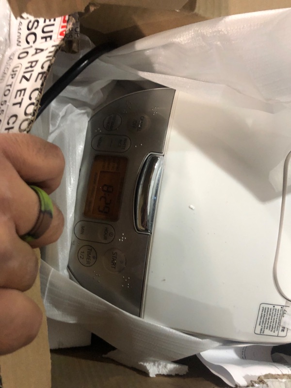 Photo 3 of **USED/DIRTY**
Toshiba Rice Cooker 6 Cup Uncooked – Japanese Rice Cooker with Fuzzy Logic Technology, 7 Cooking Functions, Digital Display, 2 Delay Timers and Auto Keep Warm, Non-Stick Inner Pot, White
