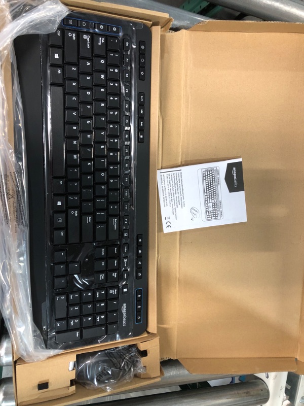 Photo 1 of Amazon Basics Wireless Computer Keyboard and Mouse Combo - Full Size - US Layout (QWERTY) & Gel Computer Mouse Pad with Wrist Support Rest