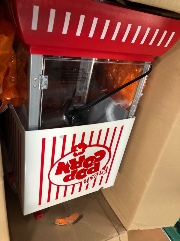 Photo 1 of **SEE NOTES**
Nostalgia Popcorn Maker Cart, 2.5 Oz Kettle Makes 10 Cups, Retro Classic Popcorn Machine with Interior Light, Measuring Spoons and Scoop, White and Red Concession Cart