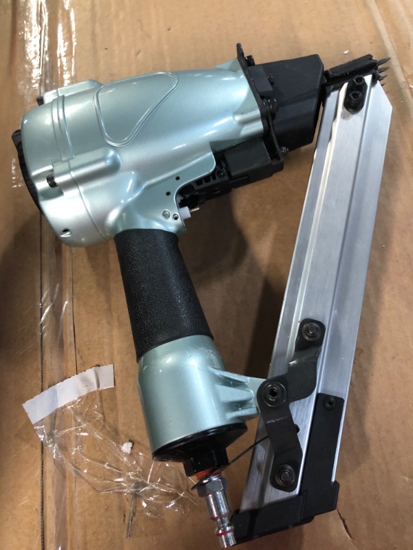 Photo 1 of ****NOSE AND TRIGGER BROKEN OFF, PARTS ONLY, NAILS LEFT IN GUN** 
Metabo HPT Metal Connector Nailer 