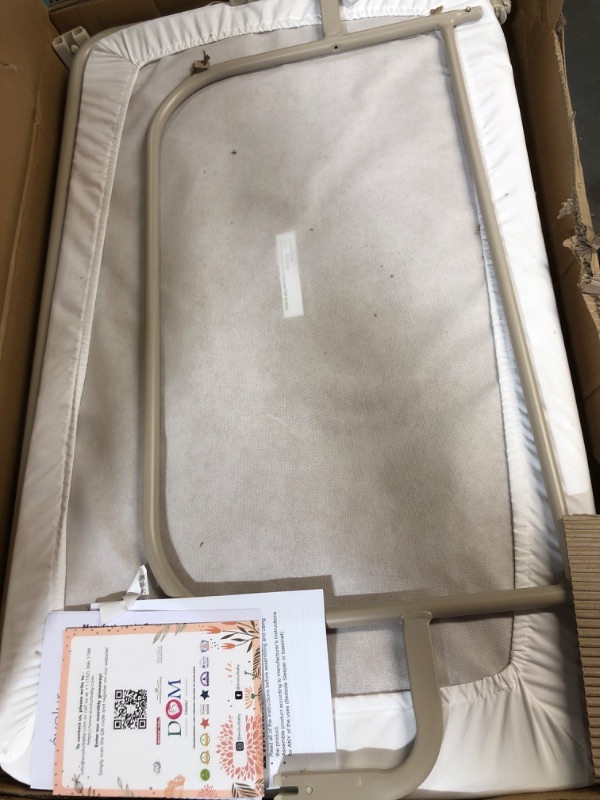 Photo 2 of Evolur Stellar Bassinet and Bedside Sleeper, Easy to Fold and Carry, Lightweight and Portable Baby Bassinet, Height Adjustable, Mattress Pad Included, Beige