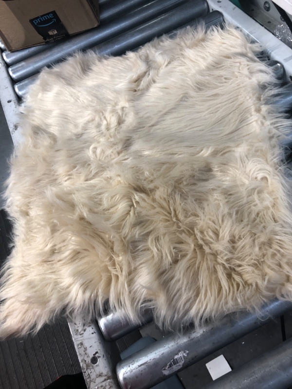 Photo 3 of **A LITTLE DIRTY** SERISSA Faux Sheepskin Fur Area Rug White Fur Chair  2x3 Feet 2 x 3 feet White