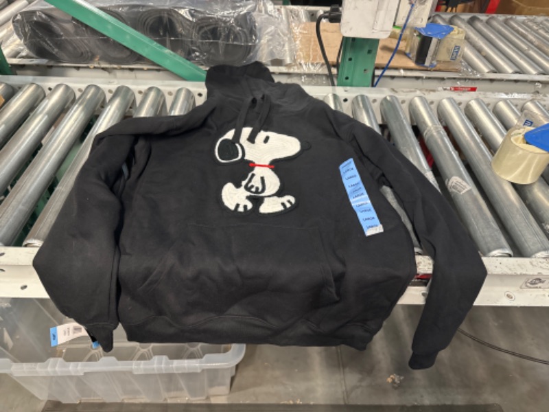 Photo 1 of large womens snoopy hoodie.