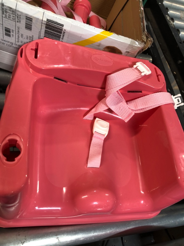 Photo 2 of **USED (DIRTY)**
Safety 1st Easy Care Swing Tray Feeding Booster, Coral Crush, One Size- PINK