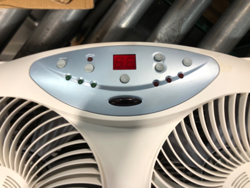 Photo 3 of **HAS BEEN USED- UNABLE TO TEST**
Bionaire Window Fan with Twin 8.5-Inch Reversible Airflow Blades and Remote Control, White 