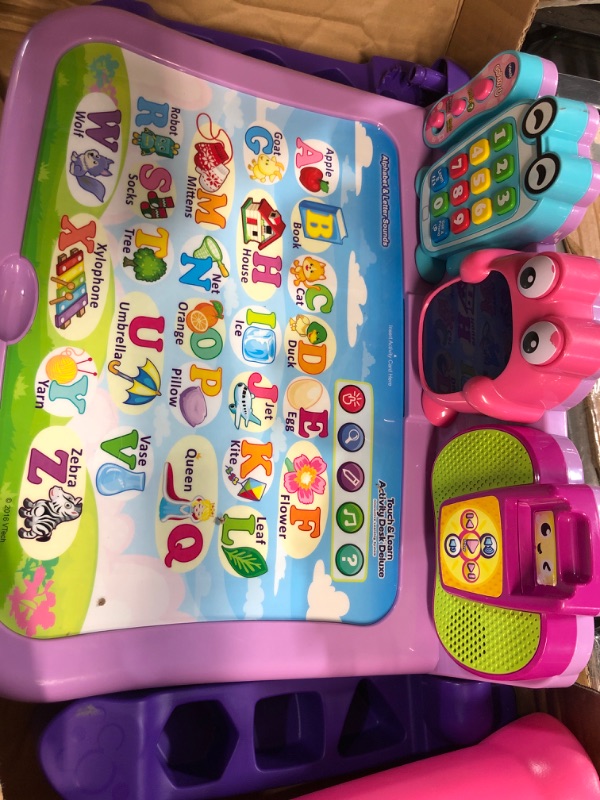 Photo 3 of **HAS BEEN USED**
VTech Touch and Learn Activity Desk Deluxe, Pink Desk Pink Standard Packaging