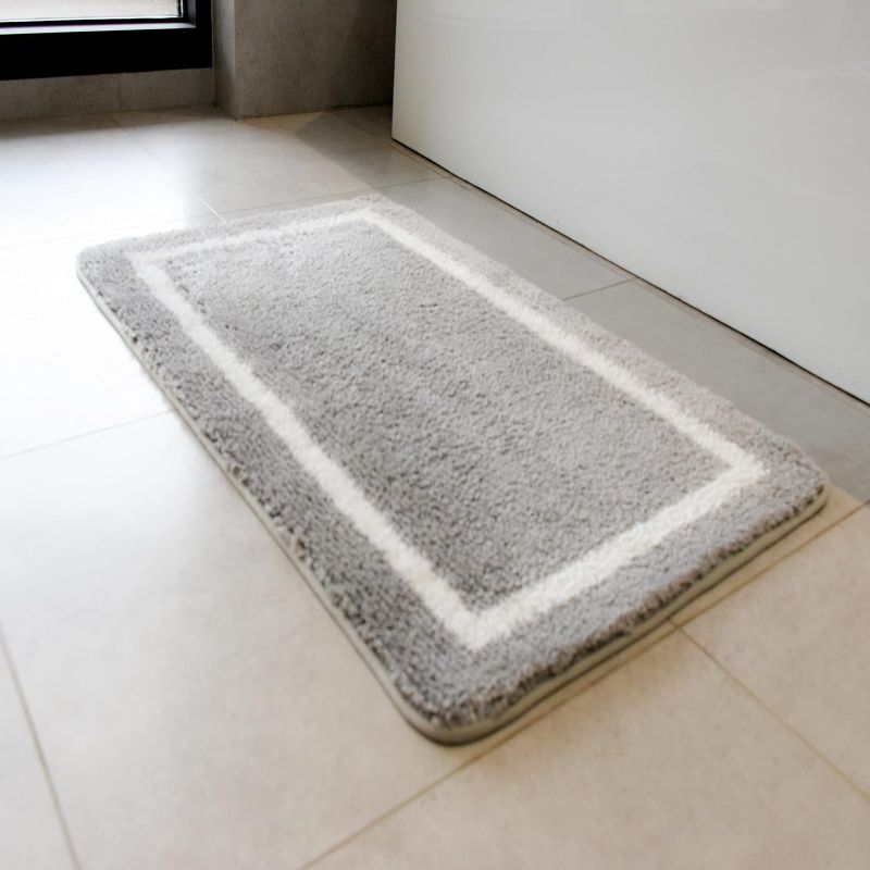 Photo 1 of **NEW, OPENED FOR INSPECTION**
SUYAOVO Grey Bathroom Rug Mat 16x24 inches