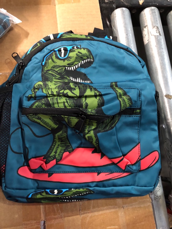 Photo 2 of **NEW, OPENED FOR INSPECTION**
Skateboard Dinosaur Kid's Backpack Green Toddler Bag with Chest Clip Schoolbag 10x4x12 