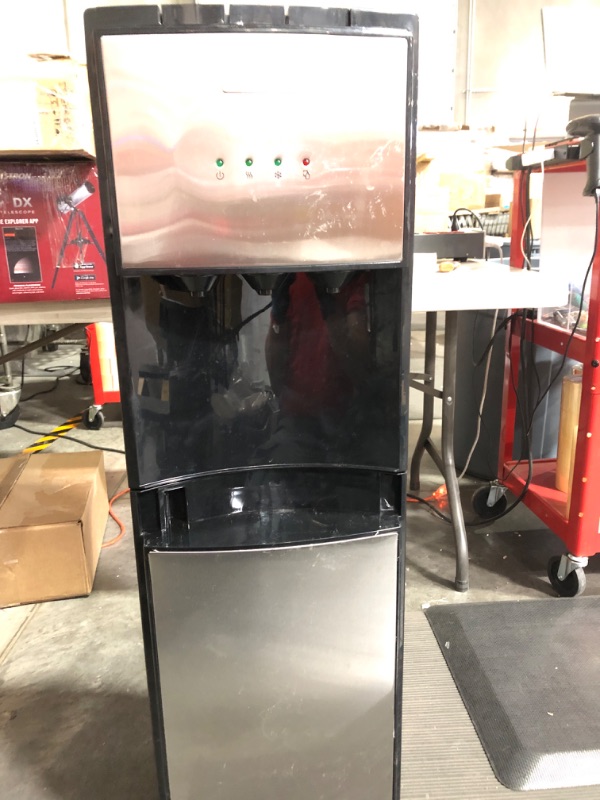 Photo 5 of **FOR PARTS**
Igloo IWCBL353CRHBKS Stainless Steel Hot, Cold & Room Water Cooler Dispenser, Holds 3 & 5 Gallon Bottles, 3 Temperature Spouts, No Lift Bottom Loading, Child Safety Lock, Black/Stainless