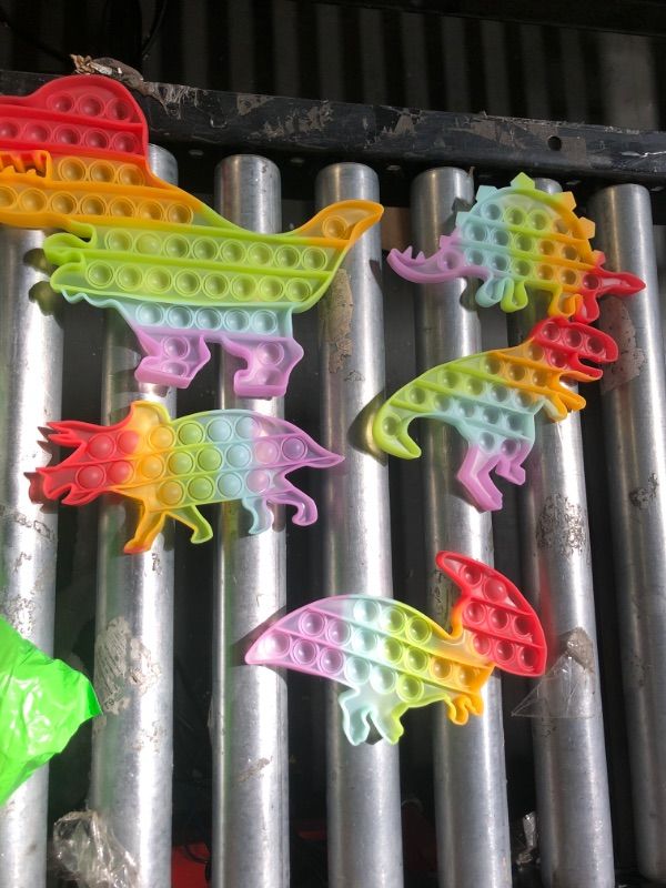 Photo 1 of Dinosaur Toys Party Favors for Kids, Fidget Toy Pop Its Bulk Pack, Stocking Stuffers Sensory Toys Autistic Children Autism ADHD Boys Girls, Treasure Prize Box Fidgets Popit Classroom Small Stress Gift