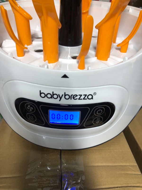 Photo 2 of Baby Brezza Baby Bottle Sterilizer and Dryer Machine – Electric Steam Sterilization - Universal Fit - Pacifiers, Glass, Plastic, and Newborn Feeding Bottles