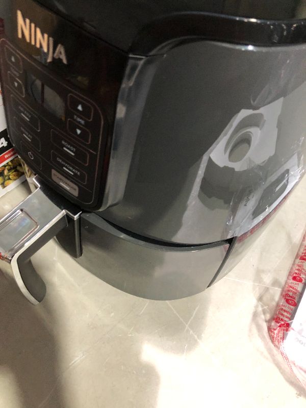 Photo 1 of ***DAMAGED - NONFUNCITONAL - SEE NOTES***
Ninja AF101 Air Fryer that Crisps, Roasts, Reheats, & Dehydrates