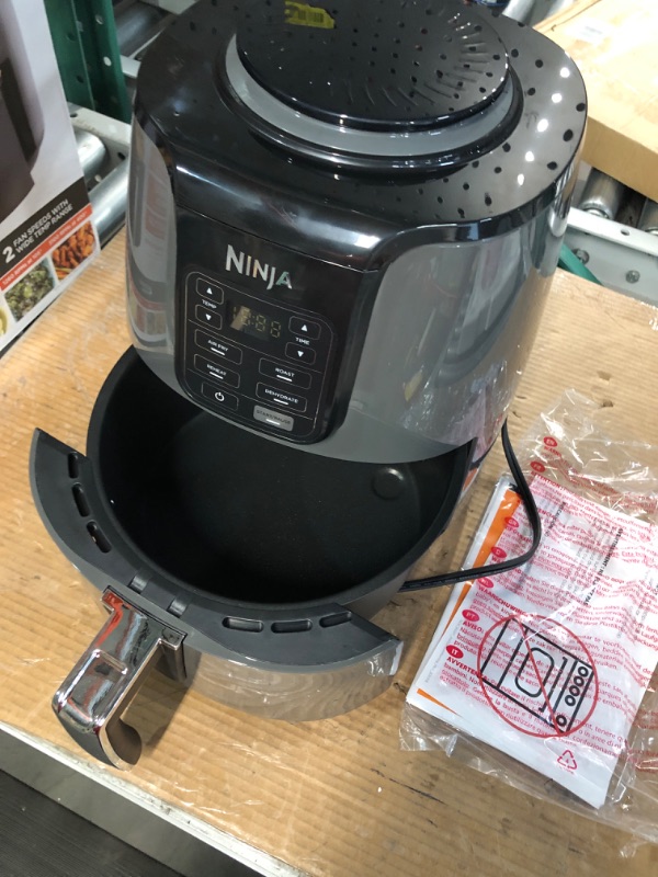 Photo 4 of ***DAMAGED - NONFUNCITONAL - SEE NOTES***
Ninja AF101 Air Fryer that Crisps, Roasts, Reheats, & Dehydrates