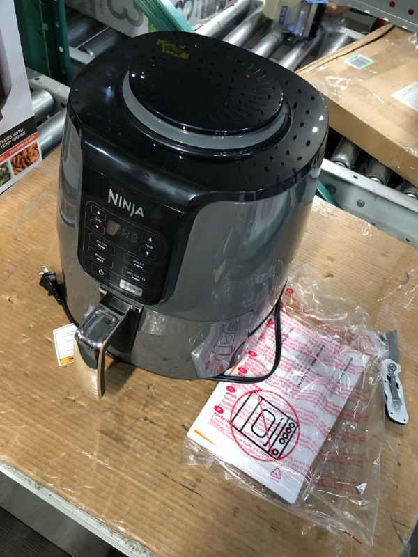 Photo 2 of ***DAMAGED - NONFUNCITONAL - SEE NOTES***
Ninja AF101 Air Fryer that Crisps, Roasts, Reheats, & Dehydrates