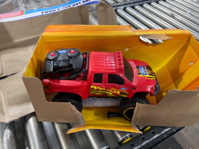 Photo 2 of ?Hot Wheels Remote Control Truck, Red Ford F-150 RC Vehicle With Full-Function Remote Control, Large Wheels & High-Performance Engine, 2.4 GHz With Range of 65 Feet HW FORD TRUCK RC