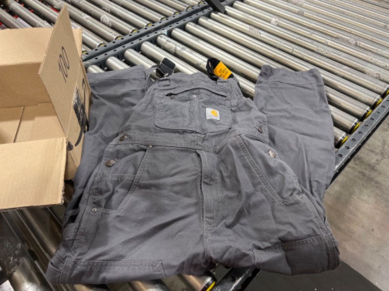 Photo 2 of Carhartt mens Rugged Flex® Relaxed Fit Canvas Bib Overall 30W x 30L Gravel