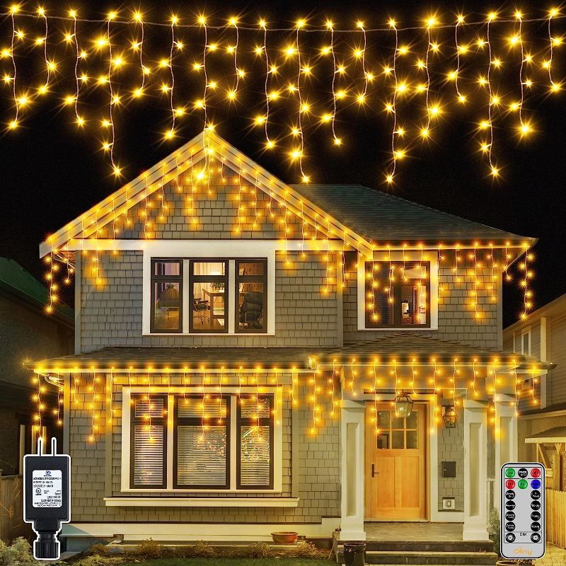 Photo 1 of Ollny Icicle Christmas Lights Outdoor, Icicle Lights 594LED 49ft Connectable Hanging Fairy String Lights with 99 Drops, 8 Modes Remote Clear Wire Curtain Ice Lights Indoor Decorations (Warm White)
