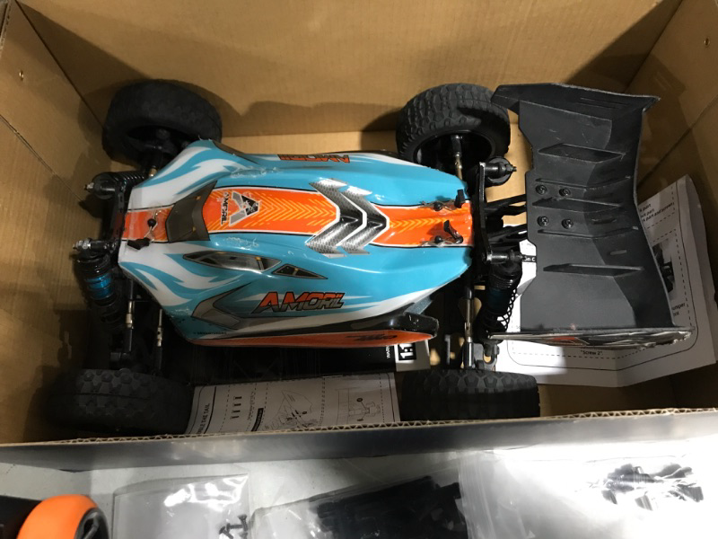 Photo 4 of AMORIL 1:14 Fast RC Cars for Adults,Top Speed 70+KMH Hobby Remote Control Car, 4X4 Monster Truck Racing Buggy,Electric Vehicle Toy Gift for Kids with Oil-Filled Shocks,Upgraded Powder Gear Parts
