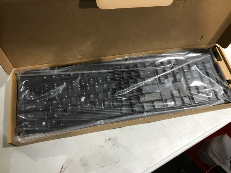 Photo 1 of Amazon Basics Wireless Keyboard-Quiet and Compact-US Layout (QWERTY)