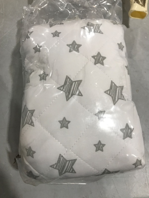 Photo 1 of Crib foam mattress pad and mattress protector