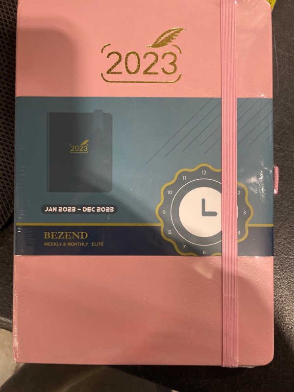 Photo 1 of 2023 Planner by BEZEND, A5 Calendar 5.8" x 8.5", Daily Weekly and Monthly Agenda with Pen Holder,FSC Certified 80GSM Paper, Hard Cover - Pink 