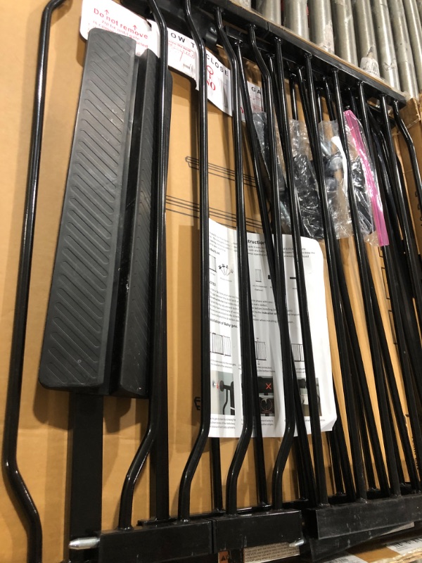 Photo 1 of 26-40 Inch Easy Install Extra Wide Pressure Mounted Metal Baby Gate, No Drilling, No Tools Required, with Wall Protectors and Extenders (Black)