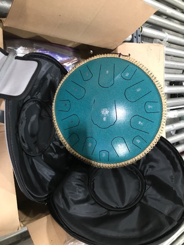 Photo 3 of Yasisid Steel Tongue Drum 14 Inches 15 Notes Musical Instruments, Handpan Drum Percussion Instrument with Soft Bag, Music Book and 2 Mallets for Meditation or Yoga (Light Green)

