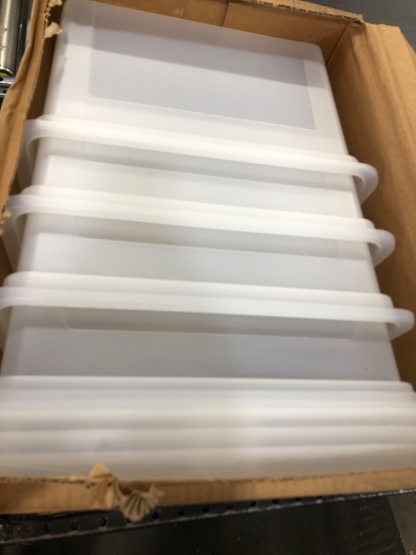 Photo 1 of Plastic white storage bins 4pk