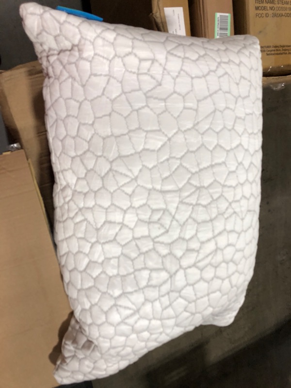 Photo 1 of 2 memory foam pillows ( one used and one new )