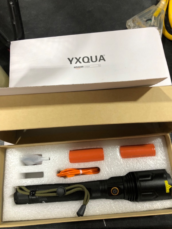 Photo 2 of YXQUA 22000 Lumens Flash Light - Super Bright 1500 Feet Powerful USB Rechargeable Flashlight with 5 Modes, Waterproof, LED Tactical Flashlight for Outdoor Camping Emergency
