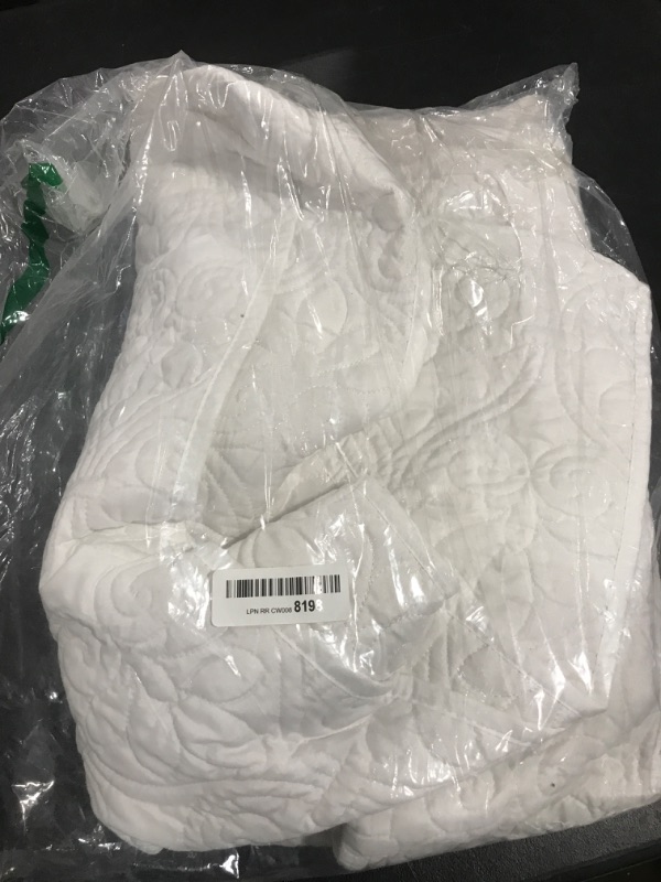Photo 1 of  WHITE QUILTED BLANKET