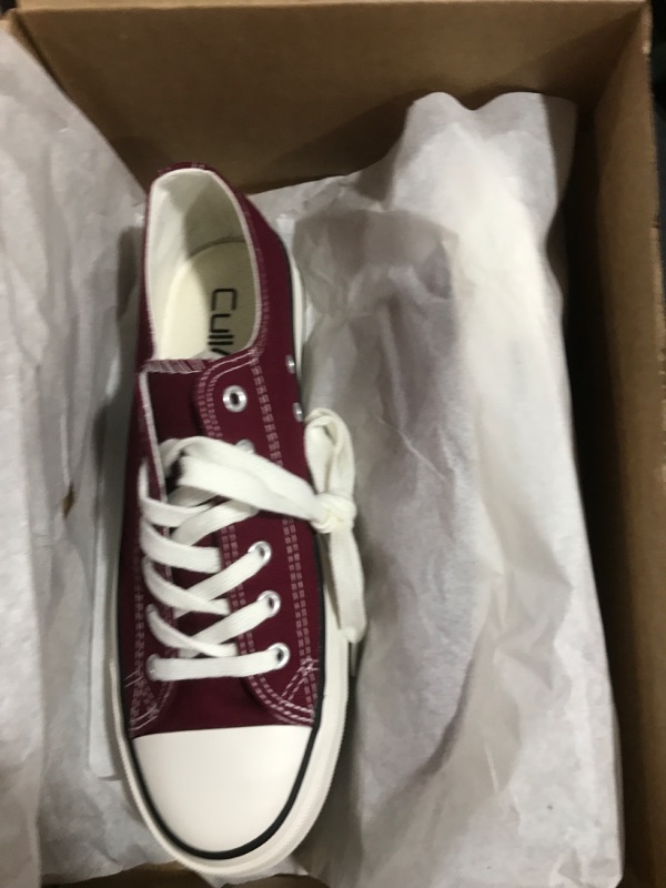 Photo 1 of BURGUNDY SNEAKERS
SIZE 9