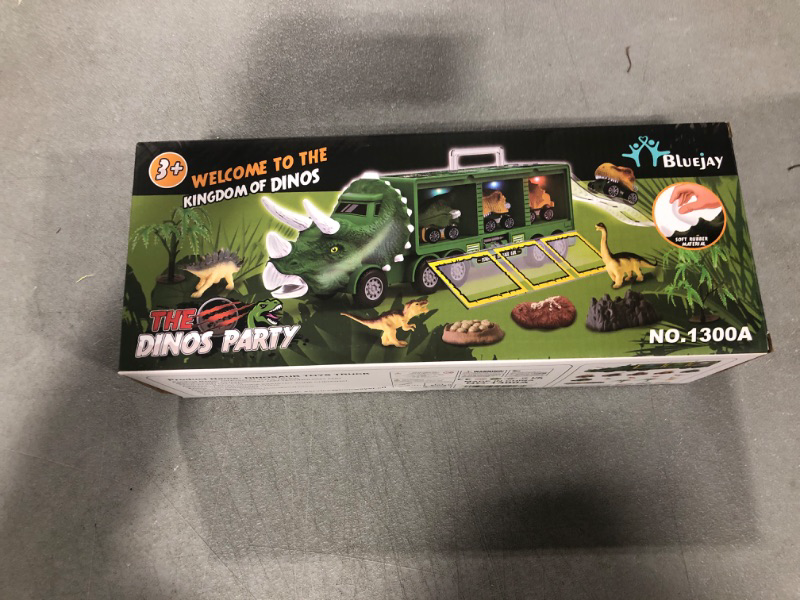 Photo 2 of BLUEJAY 21 Pack Dinosaur Toys for Kids 3-7, Dinosaur Truck with Oversized Dinosaur Map, Flashing Lights, Music and Roaring Sound, Kids Toys with 6 Pull Back Dinosaur Cars, 6 Dinosaur Toys (Green)