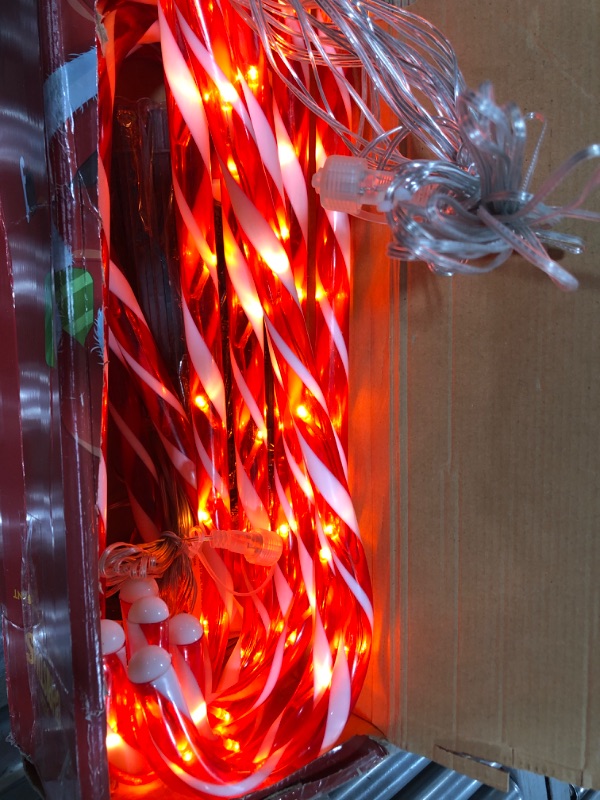 Photo 3 of 24.5" Candy Cane Lights with Stakes, 12 Packs Large Christmas Pathway Lights Outdoor, 8 Light Modes Candy Cane Pathway Markers Christmas Decorations for Yard Patio Garden Walkway Sidewalks
