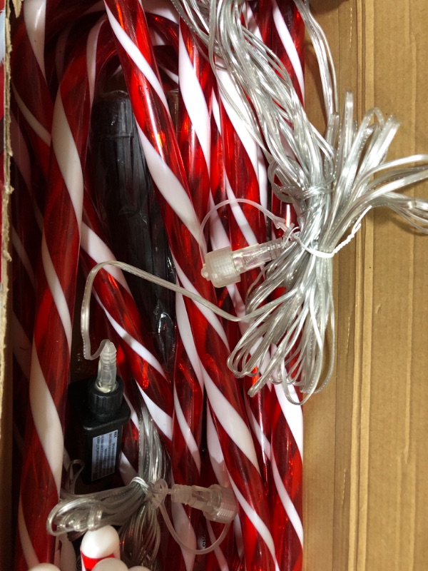 Photo 2 of 24.5" Candy Cane Lights with Stakes, 12 Packs Large Christmas Pathway Lights Outdoor, 8 Light Modes Candy Cane Pathway Markers Christmas Decorations for Yard Patio Garden Walkway Sidewalks
