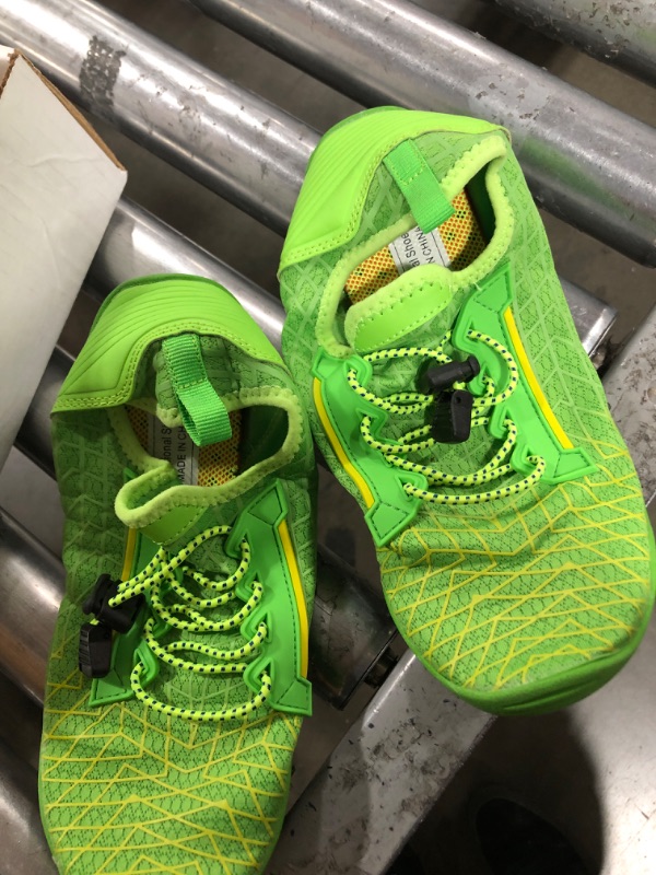 Photo 1 of 5.5 green swimming  shoes