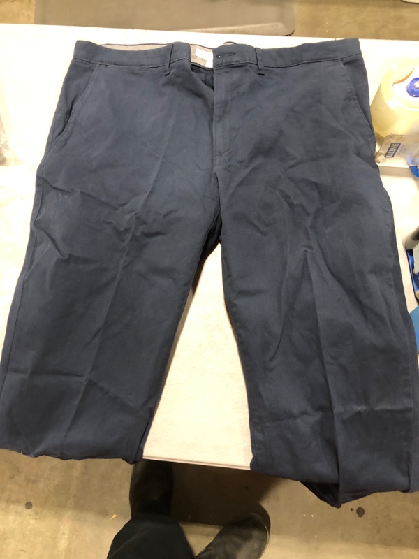 Photo 1 of AMAZON BASICS MENS PANTS    42 X 32 