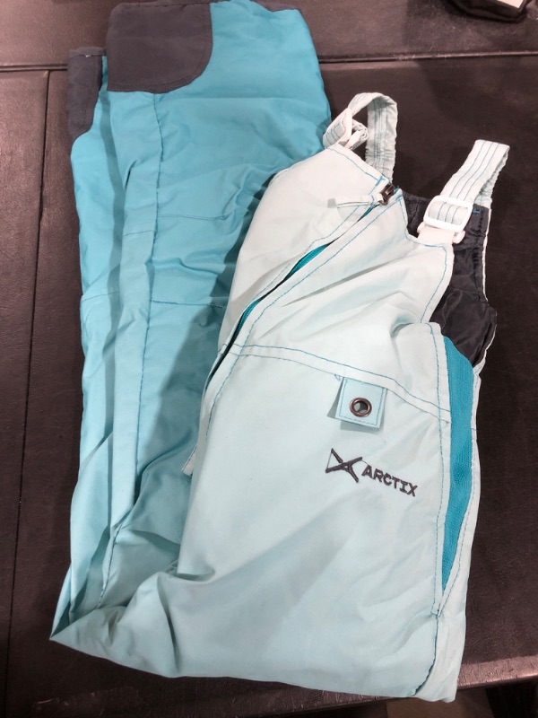 Photo 1 of ARCTIX KIDS SMALL INSULATED OVERALLS  
COLOR-TEAL
SIZE-SMALL