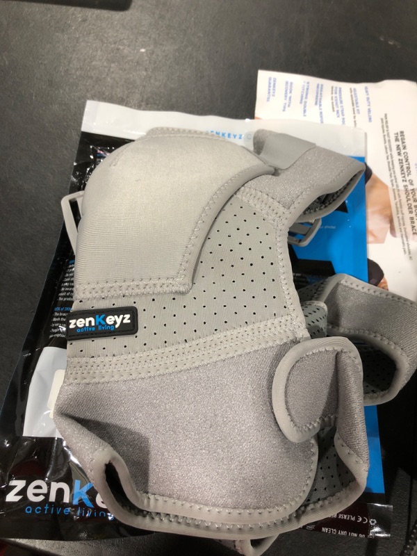 Photo 2 of ZENKEYZ Shoulder Brace for Men & Women, Shoulder Immobilizer for Torn Rotator Cuff, Tendonitis, Dislocation, Pain, Neoprene Shoulder Compression Sleeve Wrap (Gray, Large/X-Large)
