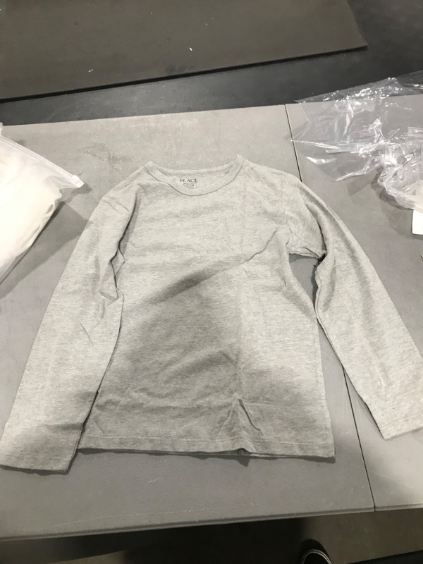 Photo 1 of Child long sleeve Medium 7/8